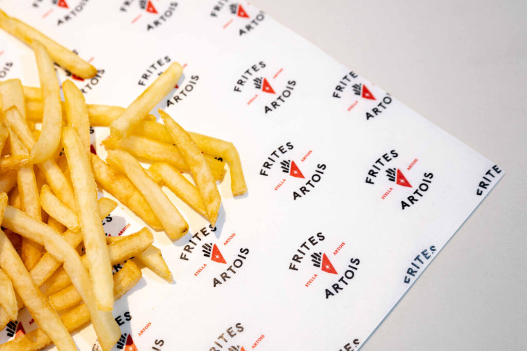 freanch fries on a custom deli paper